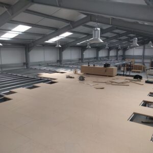 a mezzanine floor designed by Rack Storage Systems and being installed on site.